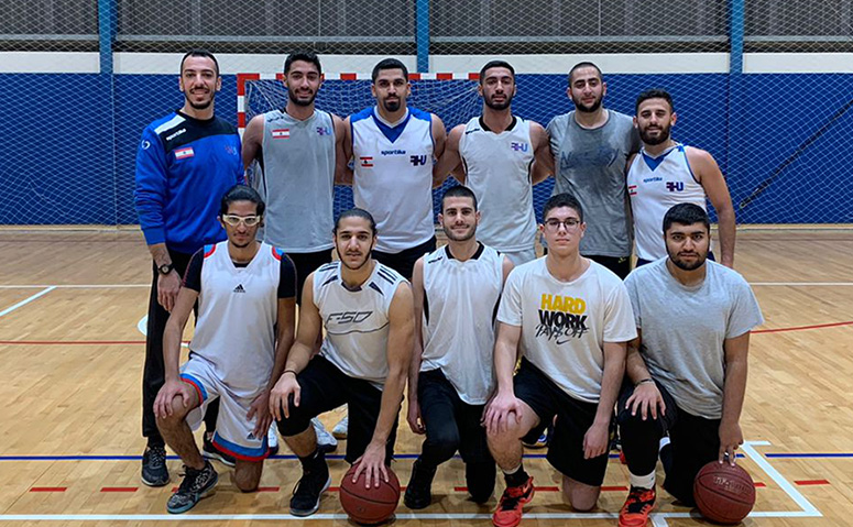 Cheers to a big win for the RHU team in basketball