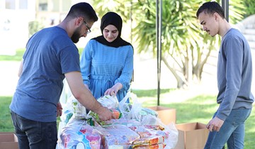 RHU clubs and societies gather donations to provide food boxes for families in need during Ramadan