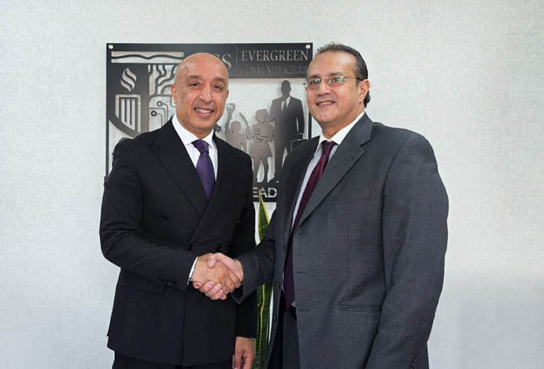 RHU VP Mr. Ibrahim Akkawi with Evergreen Community School Principal Mr. Afif Halawani to discuss educational collaboration.