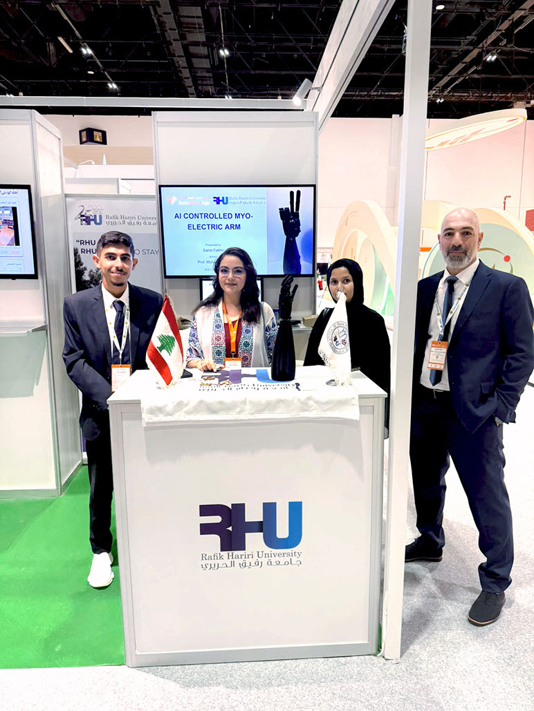 RHU Professor Mohamad Diab and student Samir Fakhour showcase RHU’s AI-controlled myoelectric prosthetic arm at AccessAbilities Expo Dubai 2026