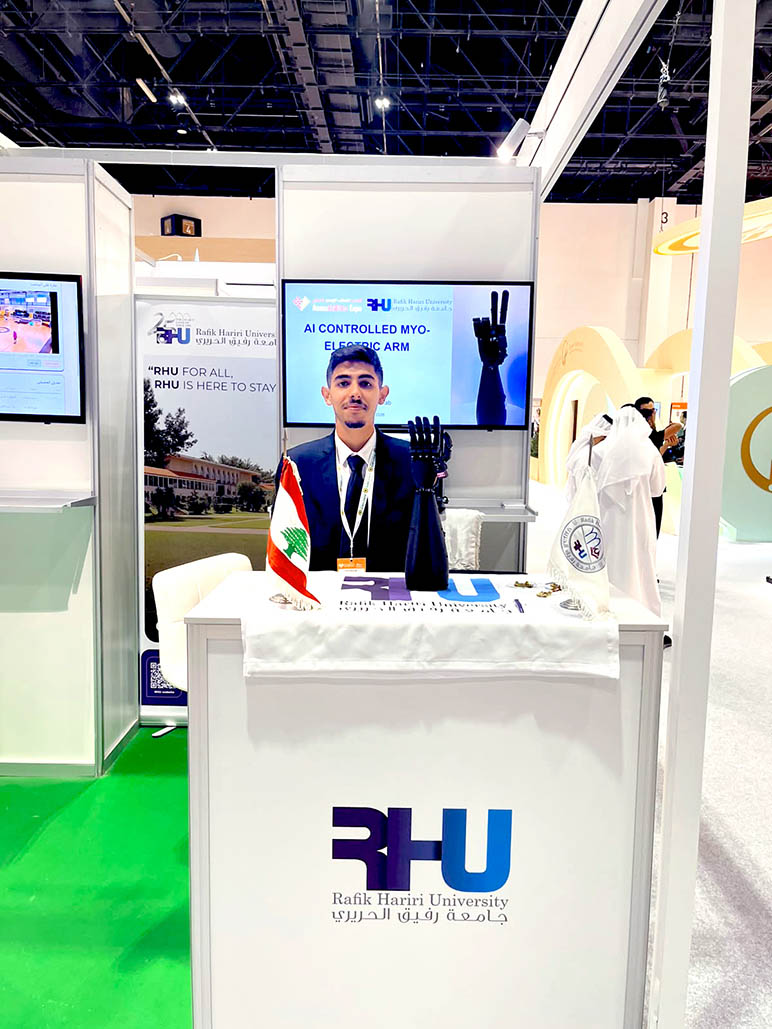 RHU Professor Mohamad Diab and student Samir Fakhour showcase RHU’s AI-controlled myoelectric prosthetic arm at AccessAbilities Expo Dubai 2026