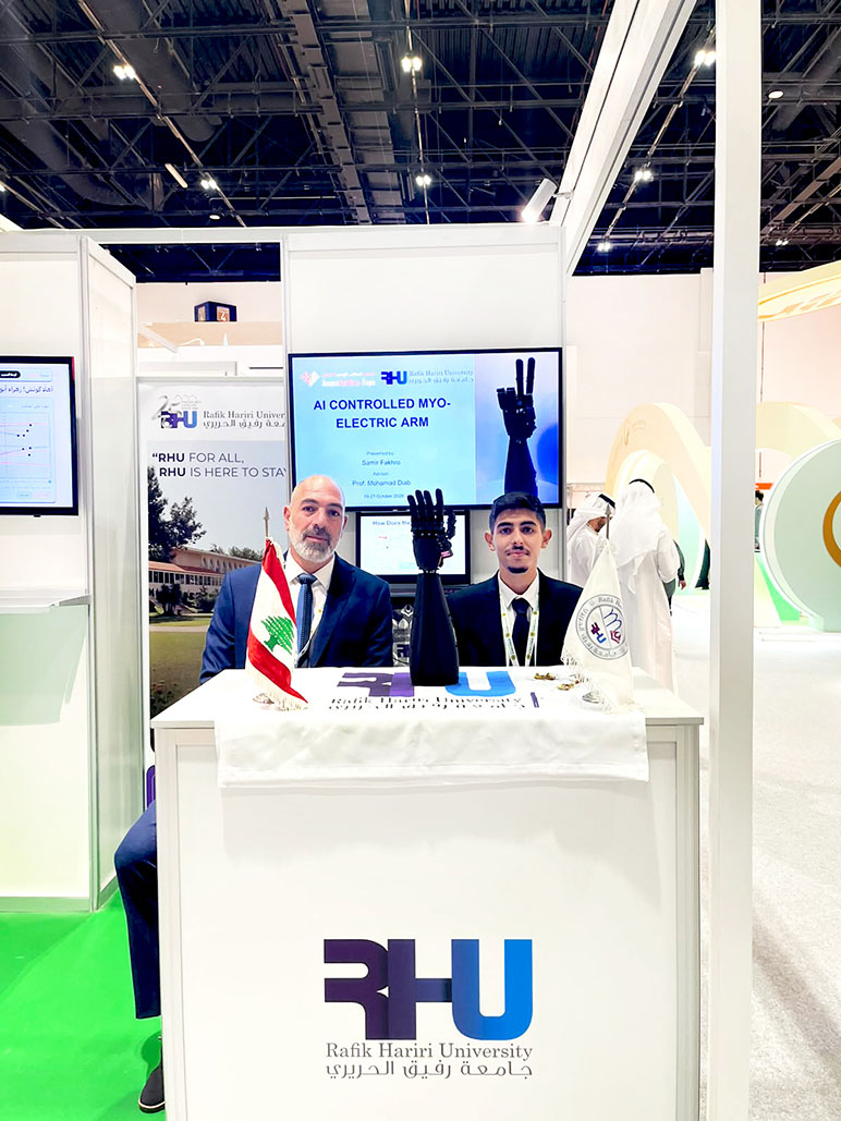 RHU Professor Mohamad Diab and student Samir Fakhour showcase RHU’s AI-controlled myoelectric prosthetic arm at AccessAbilities Expo Dubai 2026