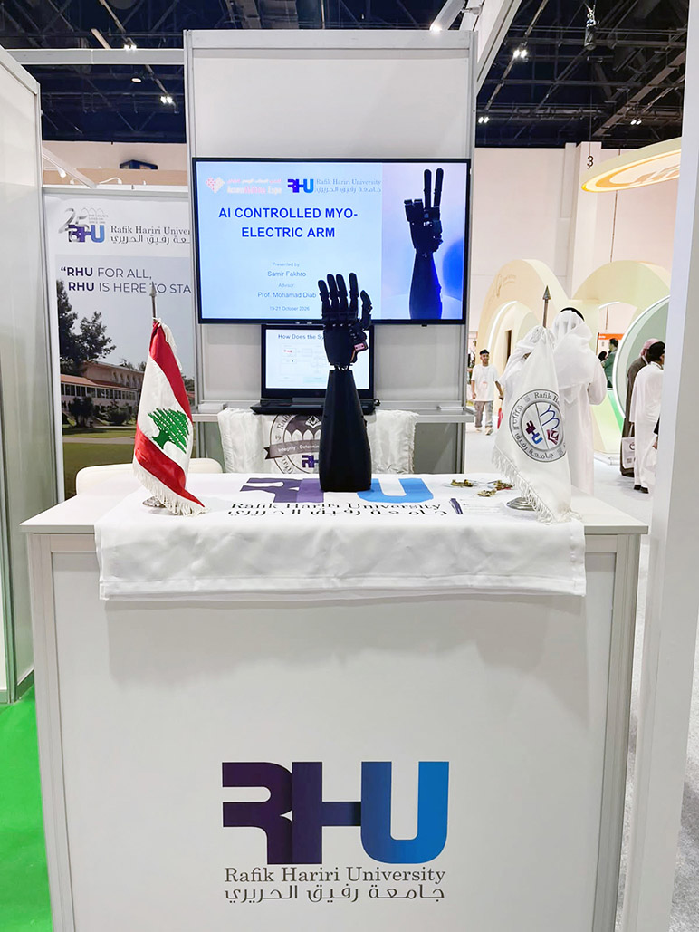 RHU Professor Mohamad Diab and student Samir Fakhour showcase RHU’s AI-controlled myoelectric prosthetic arm at AccessAbilities Expo Dubai 2026